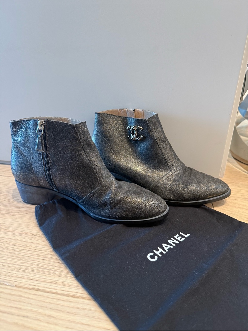 CHANEL Metallic Black Leather Ankle Booties with CC Accent